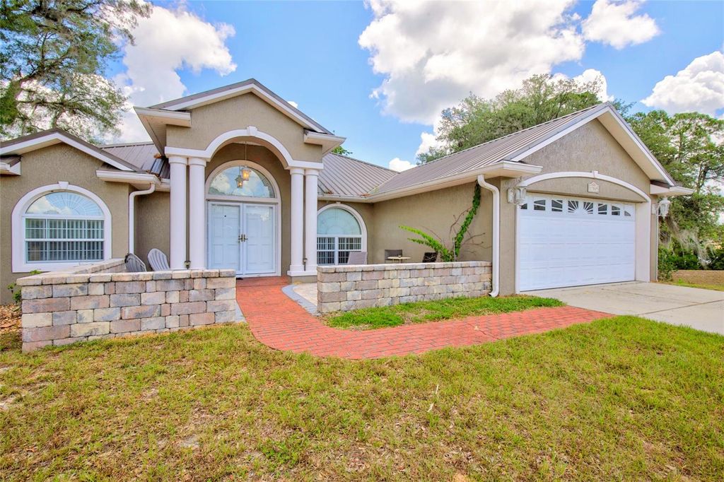 Photo of 13059 NE 7th Loop, Silver Springs, FL 34488 (MLS # OM727852)