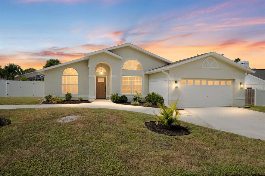 Tucked away in the desirable Briarwood neighborhood, this Florida dream home offers no flood zone, low HOA, and no CDD fees! Situated on a spacious .31-acre corner lot, this beautifully updated 4-bedroom, 3-bathroom pool home features two private primary suites and a split-bedroom floor plan. Step inside to an open-concept layout with tall vaulted ceilings, modern finishes, engineered hardwood flooring, and abundant natural light throughout. The chef’s kitchen includes a double pantry, breakfast bar, and plenty of counter space — all opening seamlessly into the living and dining areas. The laundry room features a built-in coffee bar, while Bluetooth speakers in select bathrooms add a touch of everyday luxury. All bathrooms have been completely renovated and designed to be handicap accessible if needed, offering comfort and versatility. Enjoy peace of mind with tinted windows, a generator hookup, and a new pool pump and filter. Outside, your private oasis awaits — featuring a screened-in pool with built-in solar heated Jacuzzi, a fenced yard with an additional enclosed area, and a shed that stays for extra storage. The circle driveway provides great curb appeal and easy access, complemented by a two-car garage with a smart MyQ garage door! Located just 10 minutes from the beach.  Move-in ready and packed with upgrades, this one truly has it all!