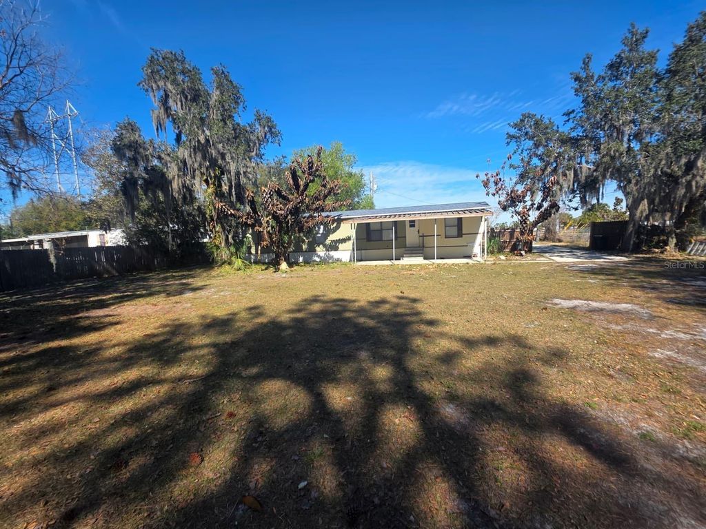Photo of 2211 Ronald Reagan Parkway, Davenport, FL 33896 (MLS # O6390571)