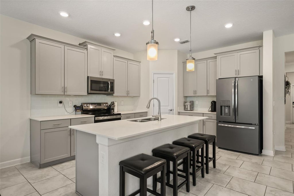 Photo of 512 Westchester Court, Davenport, FL 33837 (MLS # O6437926)