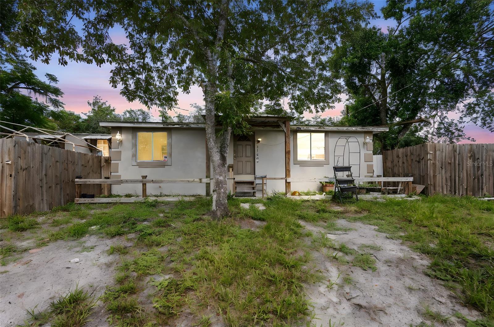 Cash-only opportunity in unincorporated Lake County! This 1985 mobile home sits on an oversized lot with a newer well, offering endless potential for investors, homesteaders, or garden and small animal enthusiasts. The home features a large screened deck and is surrounded by animal pens, cross fencing, and plenty of open space for expanding or customizing to your needs. There's ample room to park RVs, boats, trailers, or other toys, making it ideal for those who enjoy outdoor living. With no HOA and flexible use options, this fixer-upper is located near peaceful Forest Lake and just 10 minutes from a public boat launch on the St. Johns River, perfect for weekend getaways or daily nature adventures. Whether you're looking to renovate, rebuild, or simply use the land, this property offers incredible value and versatility. Information is deemed reliable but not guaranteed.