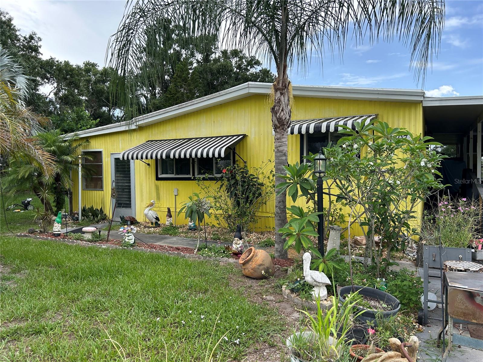 Welcome to 1307 SW Martha Street—an incredibly spacious, updated, and move-in ready double-wide manufactured home that offers great value! Featuring 2 large bedrooms and 2 full baths, some furnishings may be available, This home is in great condition probably best example available with an updated kitchen including modern cabinets, appliances, counters, lighting, fans, and windows. The oversized bedrooms are rare finds, with the primary suite offering a walk-in closet and private bath, and a shared full bath located conveniently in the hallway.
Enjoy the bright and open living area with engineered flooring and cozy carpeted bedrooms. Step into the spacious four-season screened porch with seasonal windows—perfect for relaxing any time of day. The added carport, laundry room, and accessibility ramp enhance both comfort and function.
one particular huge bonus, better than any recent similar properties that makes this a greater value: a 12x32 steel building tucked behind the home—professionally finished with insulation, paneling, electrical, lighting, and a mini-split A/C system. It’s ideal for a workspace, studio, or small business or plain storage, with two decks, a man door, and a slider for natural light.
Situated on over ¼ acre, there’s room for pets, toys, trailers, or even a boat. With two wells, septic, and a beautifully landscaped yard filled with flowering and fruit trees, this property is efficient, private, and low-cost living at its best.
Located at the quiet end of the road, you’ll enjoy peaceful evenings and plenty of space to grow. Conveniently located within 0.5 to 5 miles from downtown Arcadia, shopping, schools, hospitals, the world championship rodeo grounds, and more—plus easy access to Punta Gorda, Fort Myers, and Gulf Coast beaches. Whether you're a business owner looking for cheap way to grow and expand, start something new, remote worker, or just looking for a smart way to live, this one delivers real lifestyle value. Don't miss it!