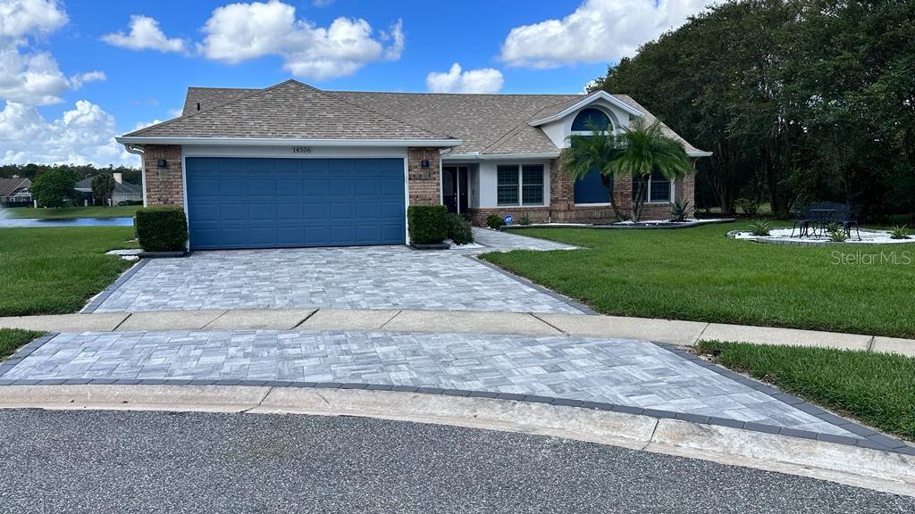 GORGEOUS! This home will leave you breathless! Pristine WATERFRONT, visible from multiple rooms, is highlighted by a nice open air pool accentuated by wrought iron fencing on the pool deck, overlooking the water! This home has been totally RENOVATED AND UPDATED! All NEWER Double panel windows as well as NEWER FRONT DOOR AND SLIDING GLASS DOOR! NEWER ceramic tile that looks like wood is in all rooms except bathrooms! Gorgeous kitchen including QUARTZ countertops, Designer cabinets. Other exciting features include RENOVATED and UPDATED BATHROOMS, all updates include quality components! Complete Stainless Steel package of NEWER APPLIANCES as well as a NEWER washer and dryer are included! The dining is highlighted with a GORGEOUS electric fireplace, looks better than a wood burning fireplace! The master bath must be seen to be appreciated, not only with quality but optimal functionality. Walk in closet in master bedroom is Cedar lined! Other updated components include Water softener and tankless water heater! The almost NEW air conditioning system was replaced in (2020)! This home has it all, anyone viewing it is guaranteed to fall in love! Beautiful Subdivision In Hunters Creek close to major highways, Shopping Centers, Restaurants. Pool Care, Security System and Lawn Care included in the rent.