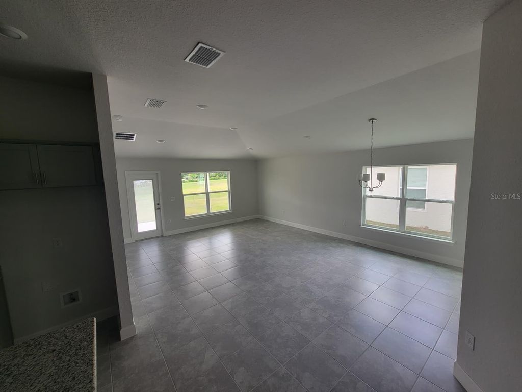Photo of 2170 NW 23rd Loop, Ocala, FL 34475 (MLS # O6403446)