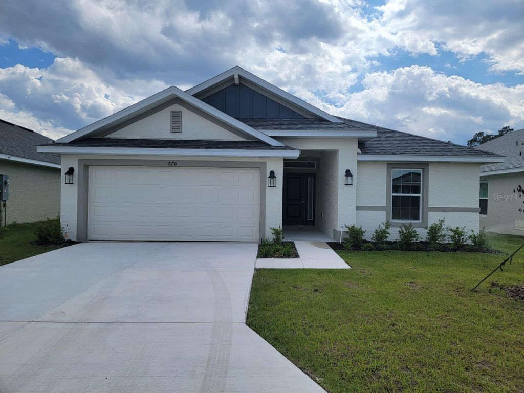 Photo of 2170 NW 23rd Loop, Ocala, FL 34475 (MLS # O6403446)