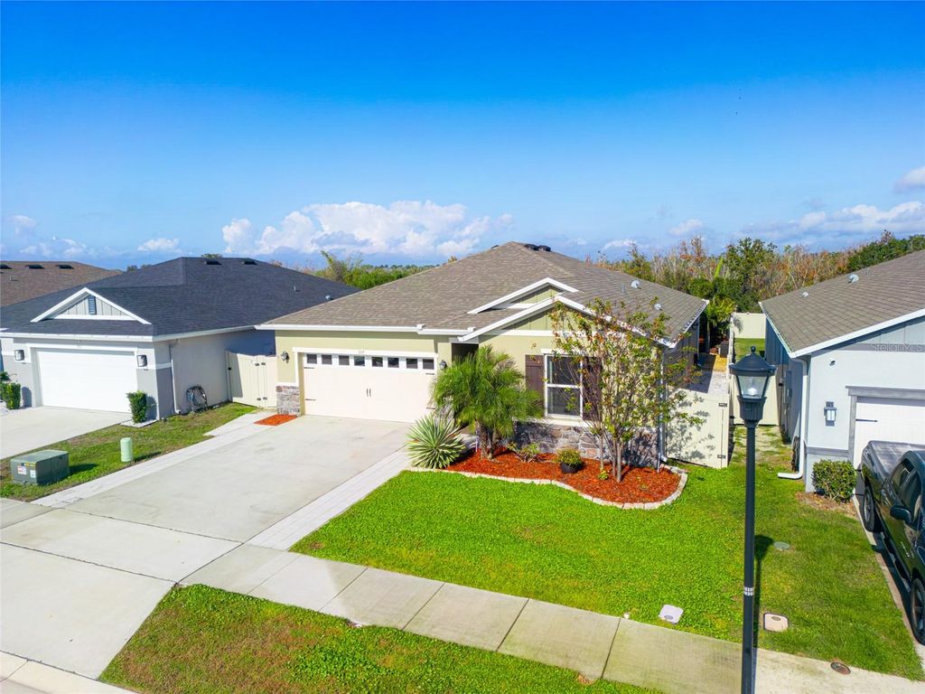 Photo of 697 Sarner Pass Way, Winter Haven, FL 33881 (MLS # P4937424)