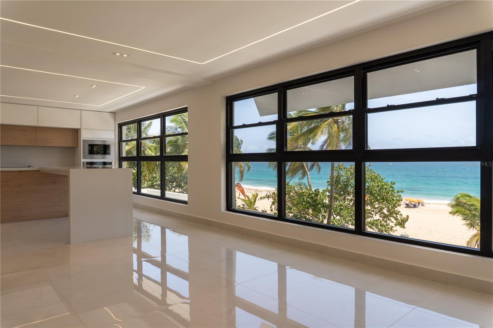 One or more photo(s) has been virtually staged. Welcome to this newly renovated, stunning oceanfront residence at Tenerife.
Please note: All images shown are architectural renderings and are for illustrative purposes only. Final design, materials, and layout may vary. Offered unfurnished. Furnished option available at higher rental rate.
This apartment boasts over 2,200 square feet of fully updated interiors, showcasing a brand-new layout and finishes throughout. Designed for comfort and sophistication, the home is currently arranged as four spacious bedrooms, two full bathrooms, and an elegant powder room. Enjoy uninterrupted ocean views through floor-to-ceiling glass walls that fill the open-concept living and dining areas with natural light. This unit also includes three covered parking spaces, offering rare convenience in Condado!
Tenerife is an exclusive, boutique condominium with 24 residences—just two units on each floor—offering direct access to the beach in Condado. Whether you prefer relaxing on the sand or diving into world-class kite surfing, the ocean is just steps away. Located in one of Condado’s most sought-after residential areas, Tenerife is next to parks like "Parque del Indio" and Stella Maris, top private schools (Saint John’s and Robinson), and Ashford Presbyterian Hospital.
Experience the best of lifestyle, location, and luxury - Don’t miss your opportunity to be part of this exclusive oceanfront community!