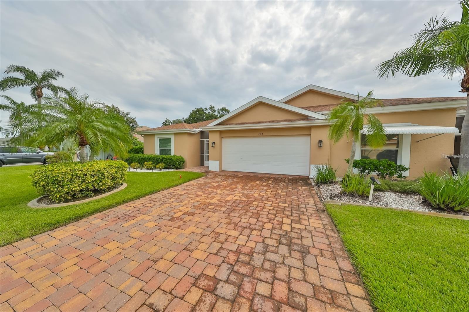 FURNISHED ANNUAL RENTAL. Ready to retire and enjoy a fun maintenance free lifestyle in a 55+ gated community? This beautiful 2 bedroom, 2 bathroom, 2 car garage turn key condominium is in the highly sought-after Manchester III area of Kings Point. This well maintained home has a screened front entry, paver driveway, dual pane hurricane windows installed throughout in 2020, and gorgeous wood look laminate flooring. The spacious interior has vaulted ceilings, and a semi open floor plan with the living room and eat-in kitchen connecting to the Florida room which leads to a screened patio. The large primary bedroom is located at the rear of the home for privacy and has a vaulted ceiling, and both a walk-in and a built-in closet. The primary bathroom has a walk-in shower, linen closet, and a dual sink vanity. The large second bedroom is light and bright, has a Murphy bed, and a built-in closet. The guest bathroom has a tub/shower combo. The back door opens to a lovely shaded lawn area, providing a tranquil outdoor space. Additionally, this home is a short walk or bike ride to the popular South Clubhouse. This inviting home offers a practical yet comfortable living experience in the heart of Kings Point. Don't miss your chance to make it your own! You'll love the Kings Point community which has amazing amenities and facilities, indoor & outdoor pools, two well appointed Clubhouses, and numerous clubs and activities just waiting for you to come and enjoy! Conveniently located between Sarasota, Tampa, and St. Petersburg, this is the perfect location to enjoy all that the Tampa Bay area is known for; airports, great shopping, dining, professional sports, and award-winning, sandy beaches. This is the best of all worlds but without the stress. Even if you are still working, you can leave it all behind and start enjoying a maintenance free resort lifestyle in one of Florida's most affordable 55+ golf cart friendly communities! Landlord pays basic cable & internet, water & sewer, Lawn maintenance, Pest control and Clubhouse dues for 2 tenants. Tenant pays electricity. Call today for a private tour! Application Link:
https://apply.link/rBJcYSQ