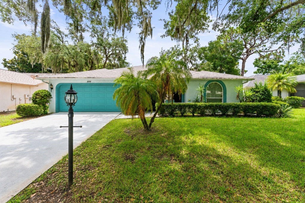 Photo of 3550 Oak Lake Drive, Palm Harbor, FL 34684 (MLS # TB8526542)