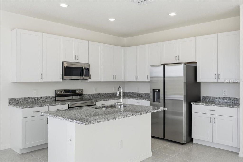 Photo of 1552 Gardiner Street, Haines City, FL 33844 (MLS # O6345268)