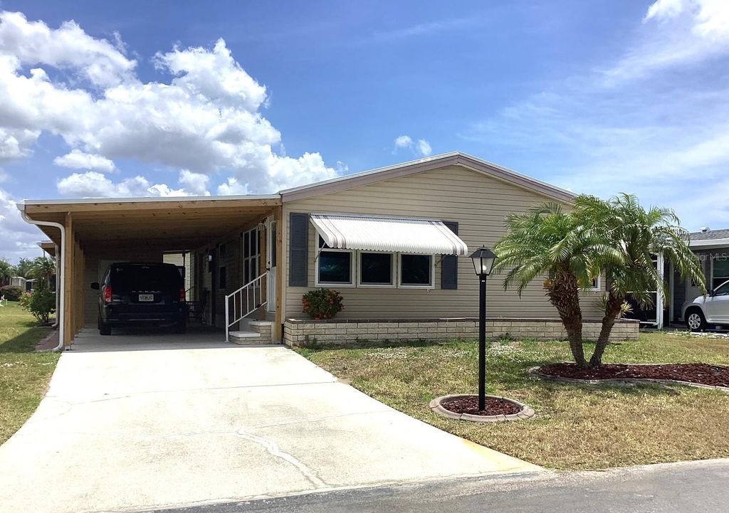 Photo of 501 Madonna, North Port, FL 34287 (MLS # T3500182)