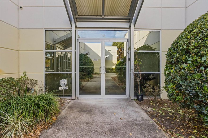 Flex Office Space.  Stylish professional office with over 350 square feet of warehouse space in the back.  4 Private Offices, 3 Open Workspaces, Spacious Reception Area, Upgraded Accessible Restroom with Shower, Kitchenette, Industrial Style Attached Warehouse has a ceiling height of 16 ft and a tall overhead door for direct truck and trailer access. Owner financing is available, please ask about terms.  Other features: travertine tile + laminate wood floors, 9ft wood frame doors with glass insert, digital locks on doors, camera system, cloud-based alarm, computer network + cloud phone system that allow remote working (subscription is required), and some office furniture is included with the sale. LOCATION: close drive to Orlando International Airport, OC Convention Center + Universal Studios + International Dr.  Quick Access and connectivity to John Young Parkway, Sand Lake Rd, Florida Turnpike, State 528, + I4.  The combination of this stylish flex office space with its proximity to key infrastructure and commercial environment makes this a prime location for businesses seeking convenience and growth opportunities.  Floor plan available.