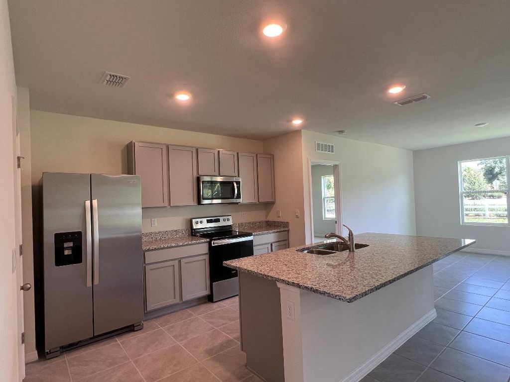Photo of 1090 August Sky Drive, Deltona, FL 32738 (MLS # O6364495)