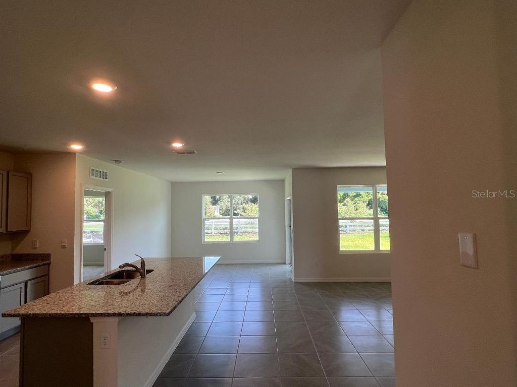 Photo of 1090 August Sky Drive, Deltona, FL 32738 (MLS # O6364495)
