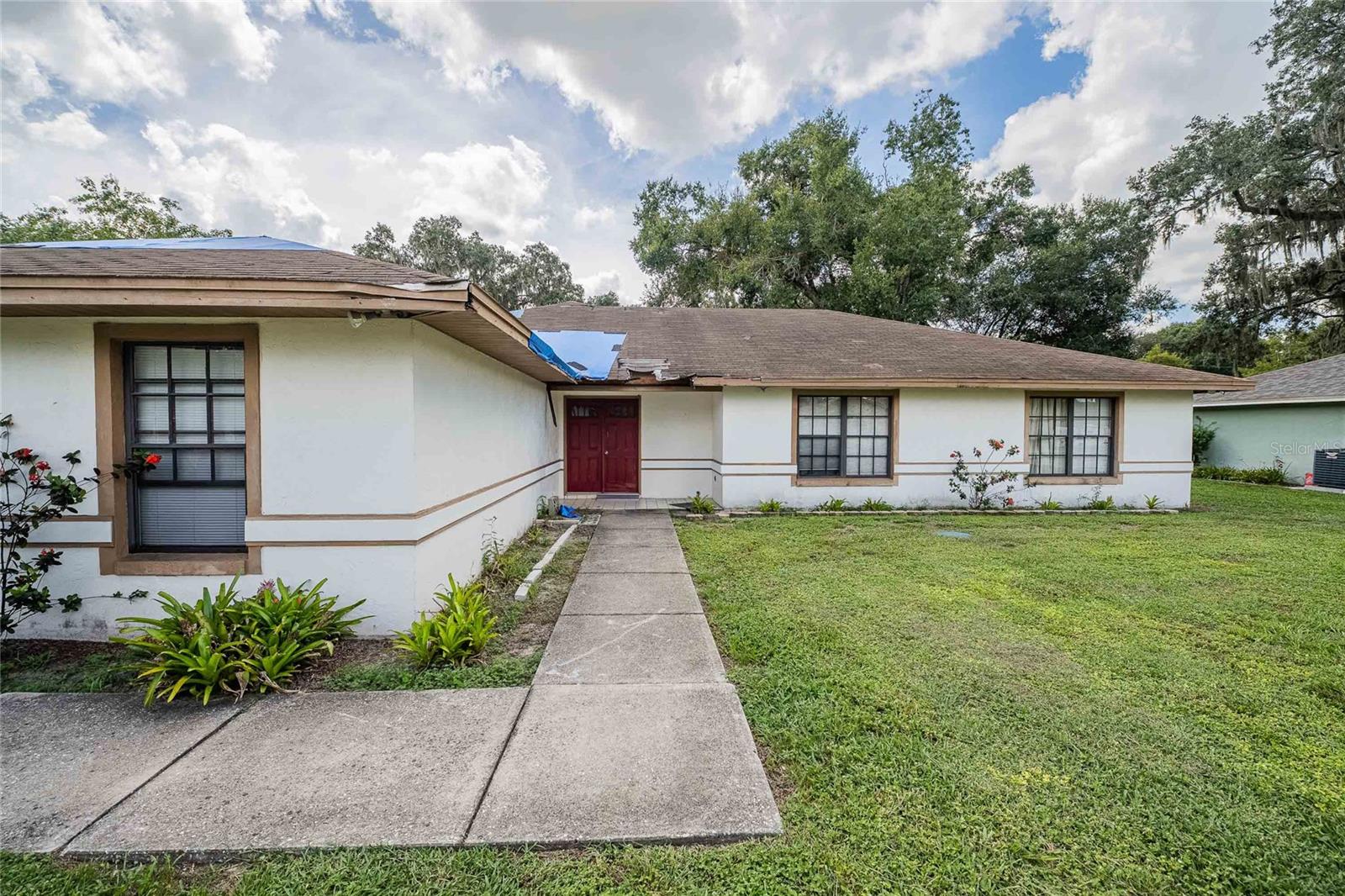 Spacious 4-Bed, 3-Bath Fixer-Upper with Pool in Desirable North Lakeland! Opportunity knocks in this expansive 4 bedroom, 3 bathroom home boasting over 3,000 sq ft under roof, located in one of North Lakeland's established neighborhoods. Featuring two master suites, this home offers incredible flexibility—ideal for multigenerational living, or even a guest retreat. Step inside to find a separate formal dining room and living room, offering the perfect layout for entertaining and everyday living. The spacious kitchen and common areas flow seamlessly into the screened-in pool and patio area, just waiting to be transformed into your own private oasis. This is a fixer-upper with solid bones and tons of potential—a great investment opportunity or the perfect canvas for a buyer who wants to customize a pool home to their taste. The home does need a new roof and some ceiling work, but the possibilities are endless with this much space in such a sought-after location. Don't miss your chance to turn this diamond in the rough into a true North Lakeland gem!