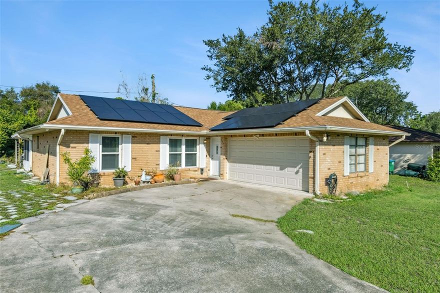 Adorable home on a nice quiet street in Deltona with a serene, private backyard. The roof and solar panels are brand new and will be paid off for the buyer at closing by the seller. Amazing opportunity to own a beautiful home near great schools, dining, shopping and highways.