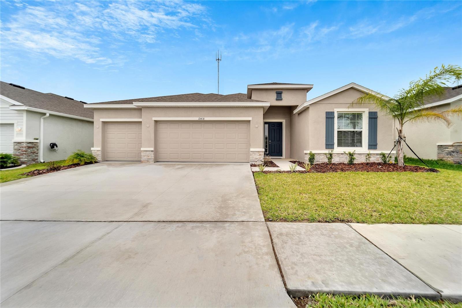 COMPLETED IN 2022, THIS 4 BED, 3 BATH HOME IS READY TO MOVE IN! Many post-construction upgrades have been made by the current homeowners including high-end lighting and ceiling fans, board and batten accents in the Great Room and Foyer, and a screened lanai. Located in Cedarbrook, the first impression of this new Riverview community is highlighted by the lovely landscaping and wide streets that give it an open and welcoming feel as you make your way to the home. You'll appreciate the front facade with stone accents and the open and airy feel as you step through the front door and into the foyer which includes a drop zone with a bench and wall storage. Continue to the spacious main living area with high ceilings that includes the Kitchen with lots of counter and cabinet space, a closet pantry, granite counters, stainless appliances, and a massive work island with a breakfast bar. The Dining area has windows all around and the triple sliders in the Great Room provide plenty of natural light. The four bedrooms include two master suites and are on a tri-split for homeowner and guest privacy. The Primary Bedroom suite includes two walk-in closets plus a bath with dual sinks, a soaking tub, and a walk-in shower. The secondary bedroom suite also includes a walk-in closet and a full en-suite bath. A guest wing that includes the remaining secondary bedrooms share another full bath. Extra highlights include a huge, walk-in storage closet adjacent to the laundry room, hurricane shutters, pre-wired for a security system, and Smart home features that control your door lock, video doorbell, and thermostat. Active lifestyles will appreciate the community amenities that include a pool, playground, dog park, pickle ball courts, and miles of sidewalks to walk and bike. There is also a public daycare being built near the main amenities that will make the drop-off and pick-up of the little ones a breeze once completed. Thank you for your interest and for taking the time to see this beautiful home in person.