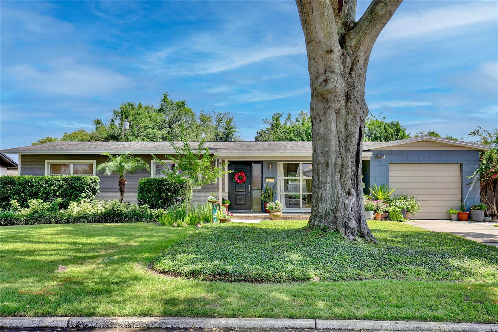 Welcome home to this beautifully landscaped pool home with 3 bedrooms, 2 baths, and an office/den. This home was made for entertaining family and friends with a perfect flow from the kitchen/dining room to the covered patio and oversized pool. The backyard is truly a resort style oasis. Home has a lot of bright and natural sunlight making this home feel much larger. Deep and loft area in the 1 car garage provides plenty of room for storage. Roof -2018, Electrical panels interior-2023, exterior-2025. Great location, only 10 minutes to Edgewater Dr, Park Ave and Winter Park shopping and restaurants are only a few minutes away. Easy access to I-4 and 417. Call today to schedule a showing, you will not be disappointed.