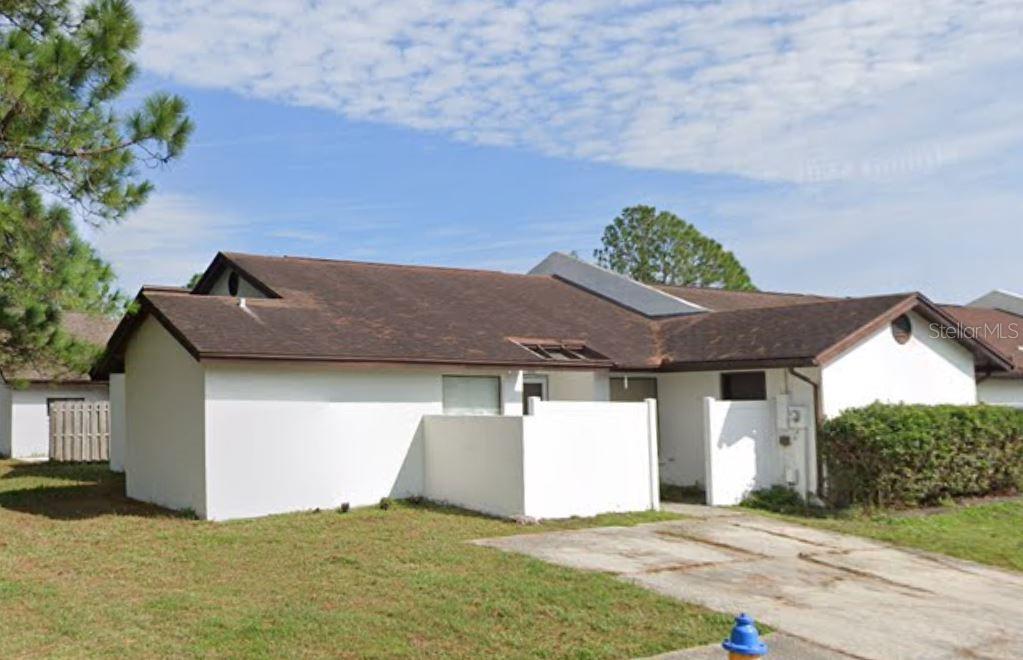 Spacious end unit villa. Well maintained three bedroom/two bath split bedroom plan with high volume ceilings. Relaxing views of tree lined pond. Seller is having a brand new shingle roof prior to closing! All current furnishings negotiable. Inside utility closet with washer & dryer. Walk-in Closet in large primary bedroom. Soaring volume ceiling in the spacious Living Room with recessed lighting over the adjacent dining area. Well maintained & a great value. No age restrictions & a low monthly HOA fee. Community pool, clubhouse, tennis & basketball courts, clubhouse, walking path, dock & playground! Great Carrollwood area near Citrus Park and within 20 minutes of Downtown Tampa, The University of South Florida, Tampa International Airport, shopping, restaurants & more. Sold "As Is, with right to inspect" *See photos & virtual tour!