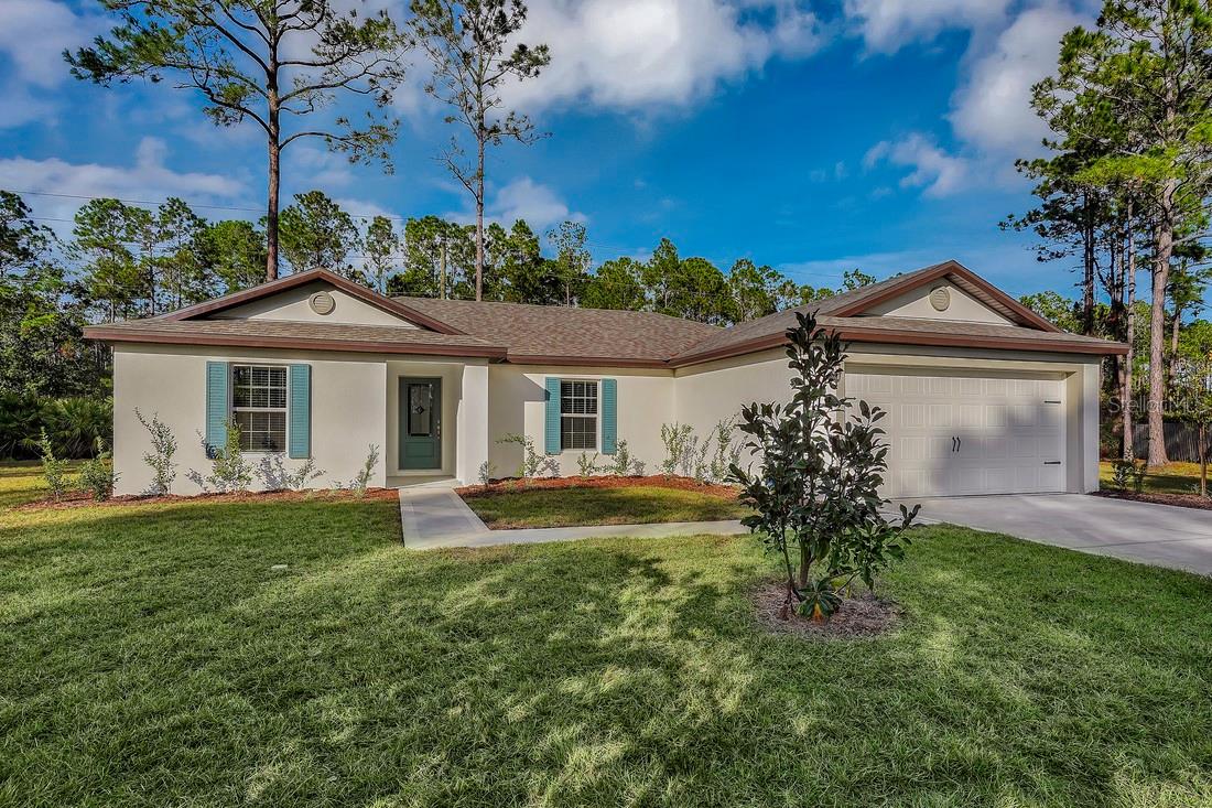 Under Construction. The beautiful Caladesi floor plan features a wide-stretched entrainment space, 3-bedroomsand 2 full bathrooms. A large great room and dining area are both centrally locatednext to the heart of the home. The Caladesi is loaded with curb appeal from its welcomingcovered front entryway to the lush front yard landscaping. Best of all, this new-constructionhome is complete with an array of included upgrades such as a full suite ofenergy-efficient Whirlpool® kitchen appliances, granite countertops, wood cabinets and an
attached garage. Palm Coast offers residents a premier location with easy access to nearby parks, conservation areas and world-class beaches.