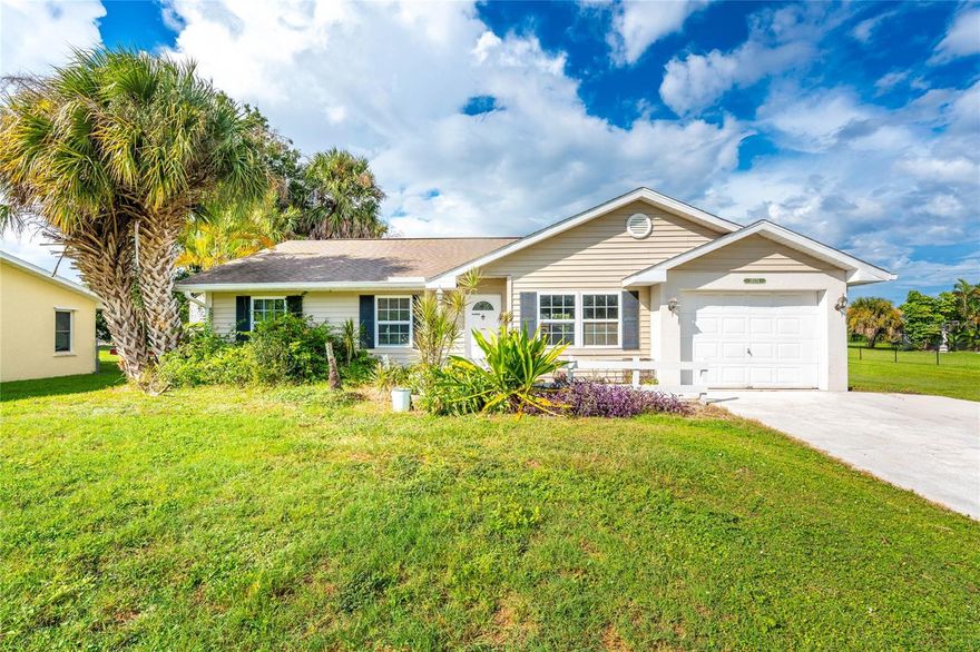 One or more photo(s) has been virtually staged. Adorable 3/2 home with a fenced yard in a waterfront community. Conveniently located to schools, shopping, activities and public boat ramps. Perfect as a permanent residence, a snowbird retreat, or an Air BnB. High ceilings and plenty of natural light make the home feel spacious. Garage has been divided to make a bonus/playroom with several closets, but could easily be returned to a single car garage. Roof replaced in 2018 and HVAC in 2020.