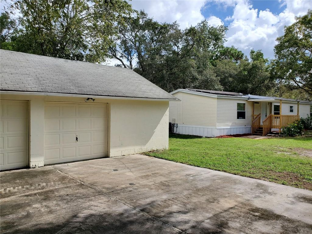 Photo of 17705 Oxenham Avenue, Spring Hill, FL 34610 (MLS # TB8418590)