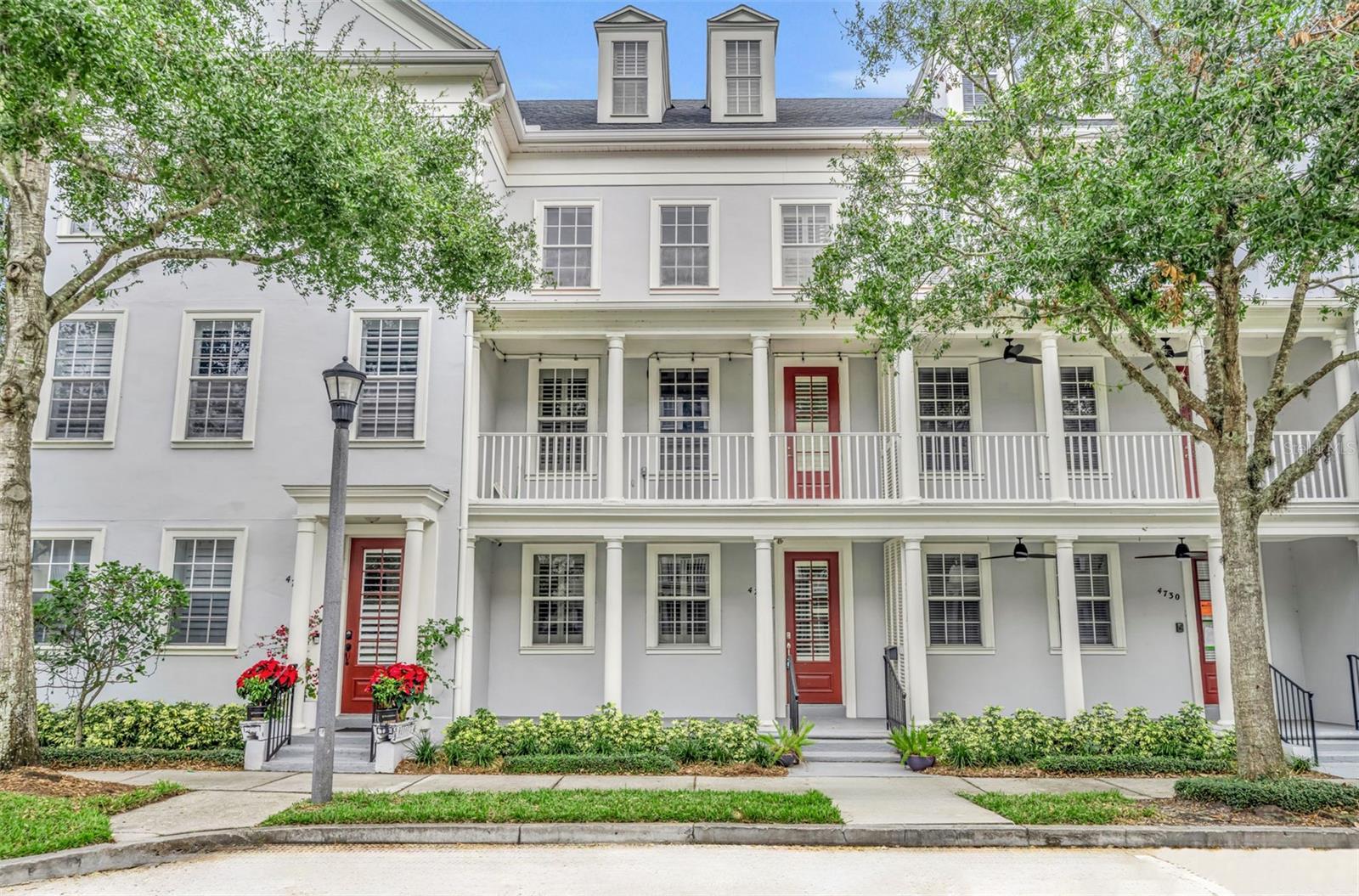 Located just 1 block from downtown Baldwin Park, convenience and style blend effortlessly in this beautifully renovated, 4-story townhome. Over 2,300 SF of updated living space offers 3 bedrooms, all with full en-suite baths, and 2 half baths. For added versatility, the 4th floor is a large bonus/media room complete with a walk-in closet and half bath. The fresh, modern interior has been updated with gorgeous, neutral laminate flooring throughout, while plantation shutters on all windows add a sophisticated touch. Enjoy a stylish kitchen and updated bathrooms, stone countertops, white cabinetry, all new interior and exterior lighting fixtures, additional LED recessed can lights, and new ceiling fans throughout.
The 1st floor includes a private guest suite with a FULL en-suite bath and walk-in closet- perfect for guests or a dedicated office.
The 2nd floor seamlessly combines the living, dining, and kitchen spaces, with a convenient powder bath and a covered front balcony off the living room, making the 2nd level ideal for entertaining. The open kitchen offers an eat-in bar, prep island, additional cabinetry and countertop space along the rear wall with a built-in wine refrigerator, and 2 pantry closets.
On the 3rd floor, you'll find 2 bedroom suites with a laundry area in-between, with a newer washer & dryer, built-in cabinets, and a countertop for folding. The front-facing primary suite features a spa-like bathroom with a large soaking tub, dual shower heads, a private water closet, and a linen closet, plus a generous walk-in closet with built-ins.
The 4th floor is a true bonus/flex area with a half bathroom and walk-in closet.
The rear-facing 2-car garage was recently painted from top to bottom, and includes a utility sink, built-in shelving, and a full freezer. There is ample guest parking, with street parking along the front, plus a parking lot behind.
With a new roof, and newer (2021) HVAC system, this turnkey city-townhome offers an unbeatable lifestyle of ease and convenience, including access to 3 community pools, fitness centers, numerous lush parks and playgrounds, and a scenic lakefront trail around Lake Baldwin.
Walkable distance to great restaurants, boutique shops, CVS & Publix, running/walking trails, community events, and great schools makes Baldwin Park one of Orlando’s most sought-after neighborhoods!