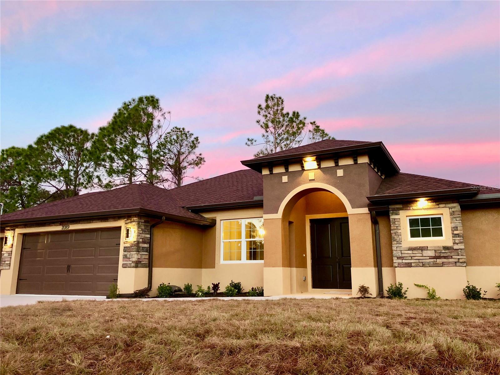 Under Construction. UNDER CONSTRUCTION! Custom home. 3/2/3 located in a rapidly growing city of North Port. Featuring backsplash in the kitchen, granite countertops and Pergo high end laminate floors throughout. Close to schools, shopping and I75. Perfect starter home, retirement home or home for anyone best describes this open floor plan. Wood soft close cabinets with granite counter tops in kitchen accompanied by stainless steel appliances and dishwasher. Upgraded finishes like recessed lights and ceiling fans make this a very desired model. Standard 1 year Warranty and 10 years Builders Bonded Warranty. Pictures are from a similar model and finishes may vary. All measurements should be verified by Buyers agent. $10k Flex Cash Available!