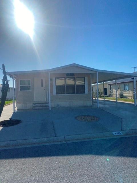 Wow! This home is convenient to any shopping or other amenities you might want or need. This 1 bedroom 1 bath has been meticulously maintained. Owner added updated the Florida room with windows in January 2025, HVAC was replaced in 2017, painted thru out, and 5 extra tie downs was added to home. You are within 20 minutes to hospital, shopping, restaurants, theatre, and parks in Zephyrhills. You are within 30 minutes to Wire Grass Mall, hospitals, theatre, restaurants, and shopping at the Tampa Premium Outlet Mall in Wesley Chapel. Golf courses in every direction for the avid golfer to pick from! How convenient! Reasonable fees in a gated community with amenities, makes this a great buy for your full time or winter retreat. Come have a look, schedule your appointment today!