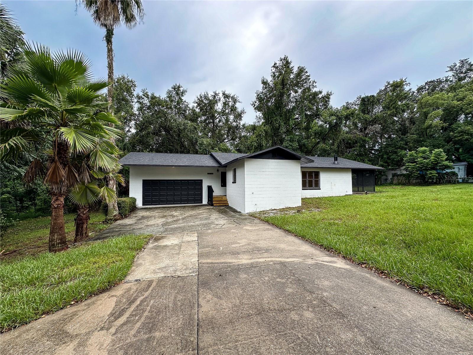 Step into this beautifully remodeled 3-bedroom, 2-bathroom home, perfectly blending modern style with everyday comfort. Situated on a spacious lot, this home has been meticulously upgraded from top to bottom.
Enjoy brand new Vinyl flooring throughout, a sleek, contemporary kitchen outfitted with brand new stainless steel appliances, and fully renovated bathrooms with premium finishes. Every detail has been carefully considered to provide both style and functionality.
Located just steps from US-441, you’ll have unbeatable access to shopping, dining, and local amenities—all while enjoying the privacy and space of a generously sized lot.
Don’t miss this turnkey opportunity—modern living and convenience at its best!