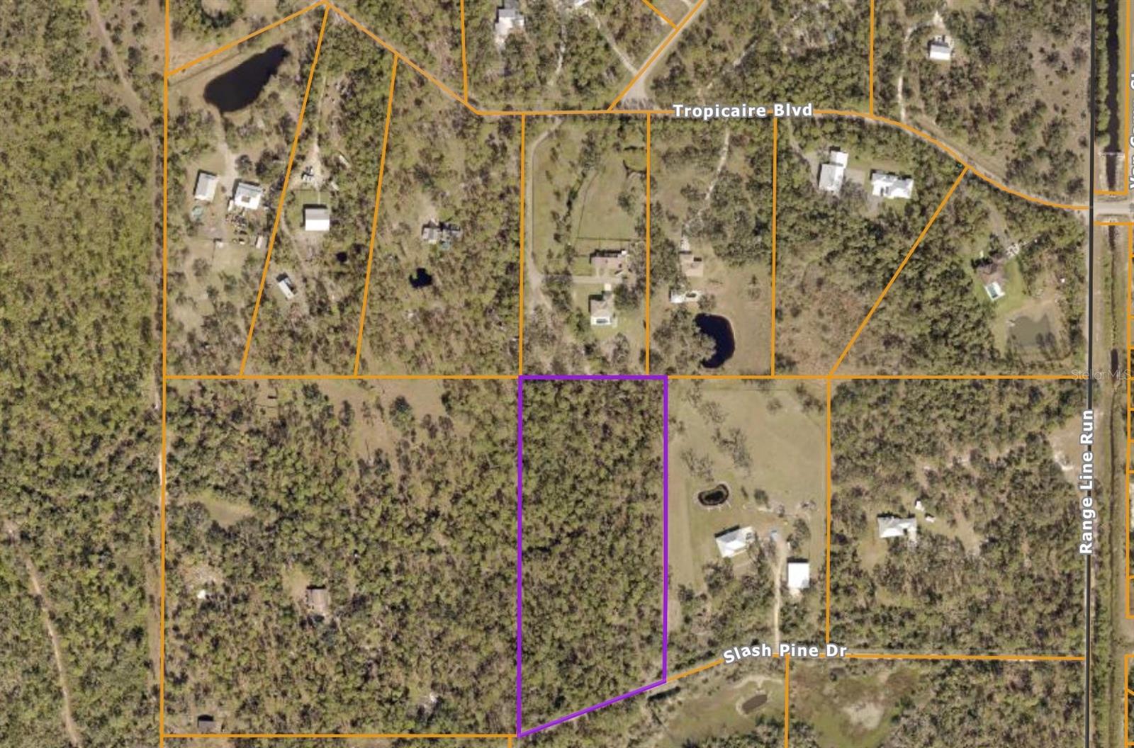 Beautiful Rare 7.15 Acre Property, in North Port Estates that is Not in a Floodzone!! Zoned as Open-Use Estate (OUE) with Mature Oak Trees for Lots of Privacy and even Electricity Onsite!! Schedule a showing today!!