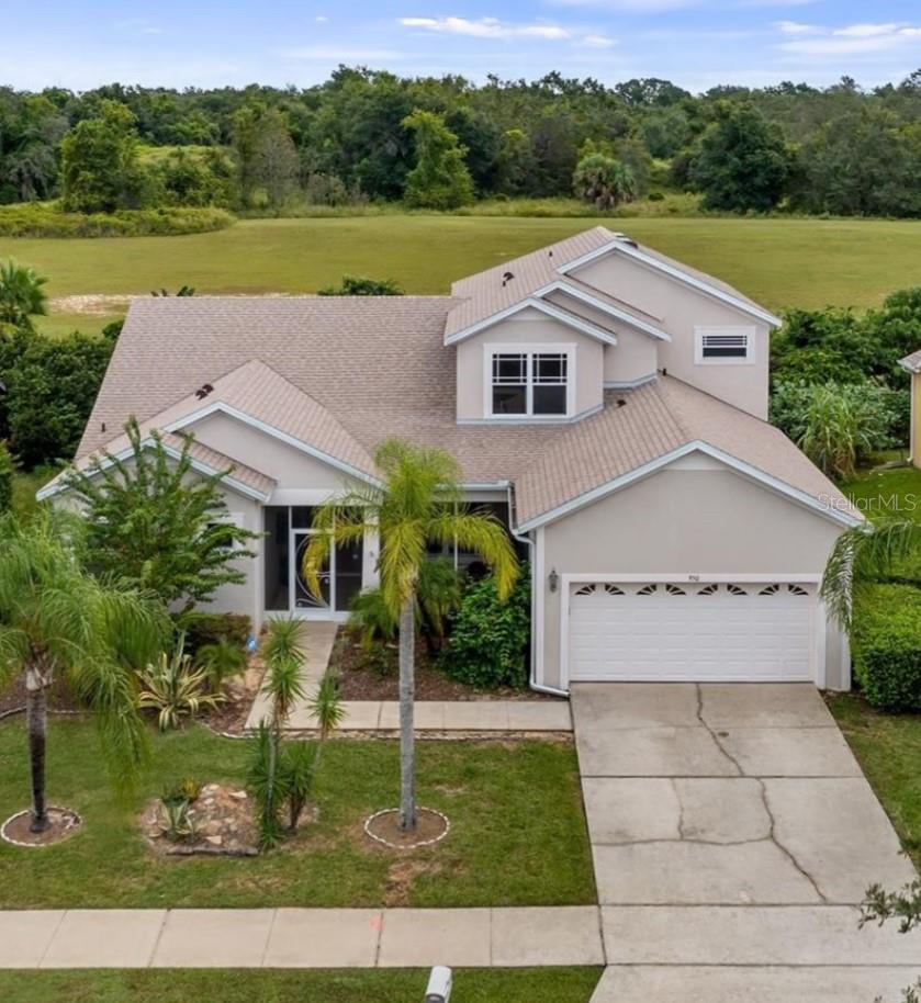 Looking for room to breathe? This spacious 4-bedroom, 2.5-bath home in Sought-After Highland Oaks, Minneola offers over 3,500 sq. ft. total under roof giving you plenty of space for everyone! Walk through the front screened in porch and step inside and be greeted by an open, sun-filled layout that feels warm and inviting from the moment you enter. The primary suite is conveniently located on the main floor with its own private en suite bath. Upstairs, you’ll find three additional bedrooms and a full bath—perfect for family or guests.The kitchen, family room, and dinette flow seamlessly together and open onto a spacious screened-in rear porch, ideal for relaxing mornings, entertaining, or evening gatherings. A convenient half bath is thoughtfully placed between the living and family rooms for guests. NO rear neighbors and this quiet, well-kept neighborhood features sidewalks perfect for morning or evening strolls and a fun playground for the little ones. You’re just minutes from everything—less than 3 miles to the Florida Turnpike entrance, groceries, restaurants, and shopping. Explore historic downtown Clermont, Waterfront Park, public boat ramps, and the weekly Farmers Market, all just 5 miles away. Orlando’s world-famous theme parks and MCO International Airport are only 40 minutes from your door, while either of Florida’s pristine coastlines can be reached in about 90 minutes. With a NEW ROOF in 2023 and a prime location, this home checks every box.?Take a virtual tour now: https://vimeo.com/1120447137 then book your private tour today.
Don’t wait—schedule your private showing today and see why this Highland Oaks gem is the perfect place to call home!