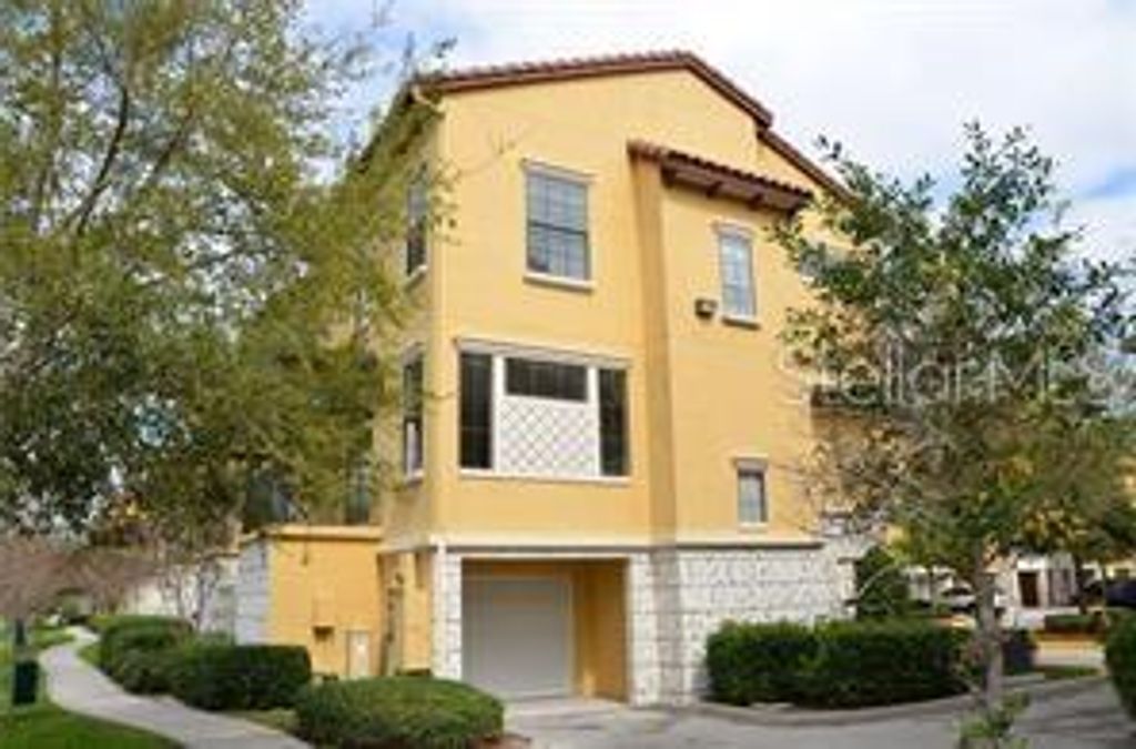 Photo of 6121 Metrowest Boulevard #101, Orlando, FL 32835 (MLS # O6407543)