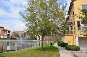 Photo of 6121 Metrowest Boulevard #101, Orlando, FL 32835 (MLS # O6407543)