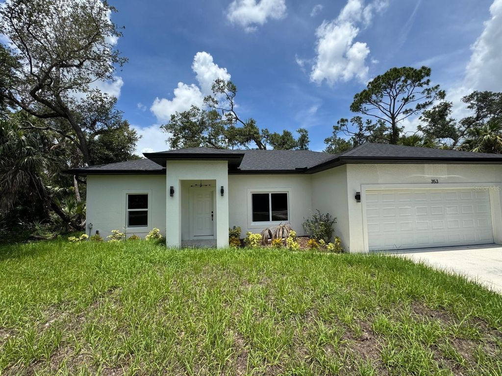 Photo of 353 Warrington Boulevard, Port Charlotte, FL 33954 (MLS # O6312860)