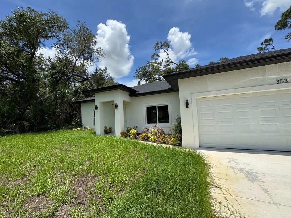 Photo of 353 Warrington Boulevard, Port Charlotte, FL 33954 (MLS # O6312860)