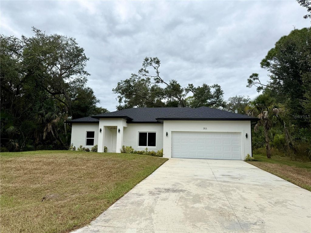 Photo of 353 Warrington Boulevard, Port Charlotte, FL 33954 (MLS # O6312860)