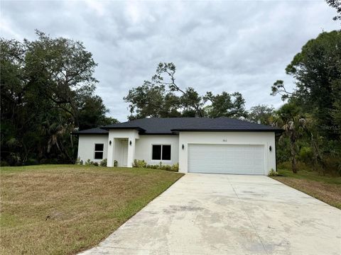 Photo of 353 Warrington Boulevard, Port Charlotte, FL 33954 (MLS # O6312860) Photo of 353 Warrington Boulevard, Port Charlotte, FL 33954 (MLS # O6312860)