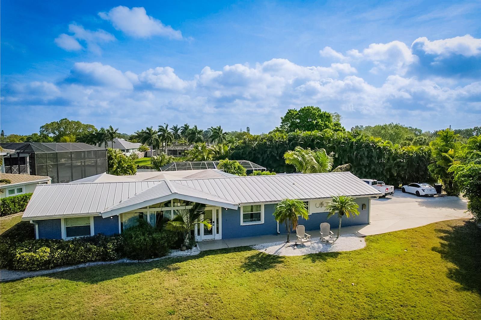 Monthly Furnished Pool & Dock House - Welcome to this spacious, fully furnished home situated on an expansive 20,000 sq ft waterfront lot, complete with a boat lift. This turn-key property features: 3 Bedrooms: Each bedroom boasts a king-size bed, private bathroom access, and ample closet space. Screened-in Lanai: Enjoy breathtaking views of the backyard and its amenities, including a deep heated private pool. Fisherman’s Paradise: A 31x21 concrete lighted dock area equipped with water, 60-amp electric, fish cleaning table, and a 10,000 lb boat lift. Located just minutes from Siesta Key by boat or car, this home offers the ultimate combination of luxury and convenience. Come find your happy place!