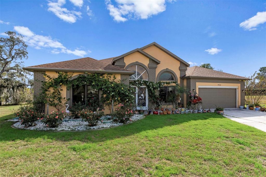 Photo of 129 N Skyflower Point, Lecanto, FL 34461 (MLS # W7881277)
