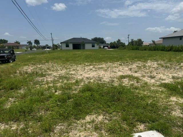 Photo of 1029 NE 1st Place, Cape Coral, FL 33909 (MLS # TB8535810)