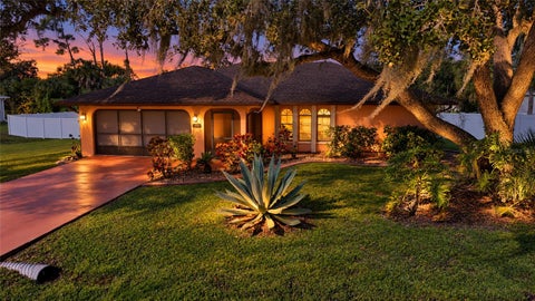 Photo of 880 Phyllis Street, Port Charlotte, FL 33948 (MLS # C7532249)