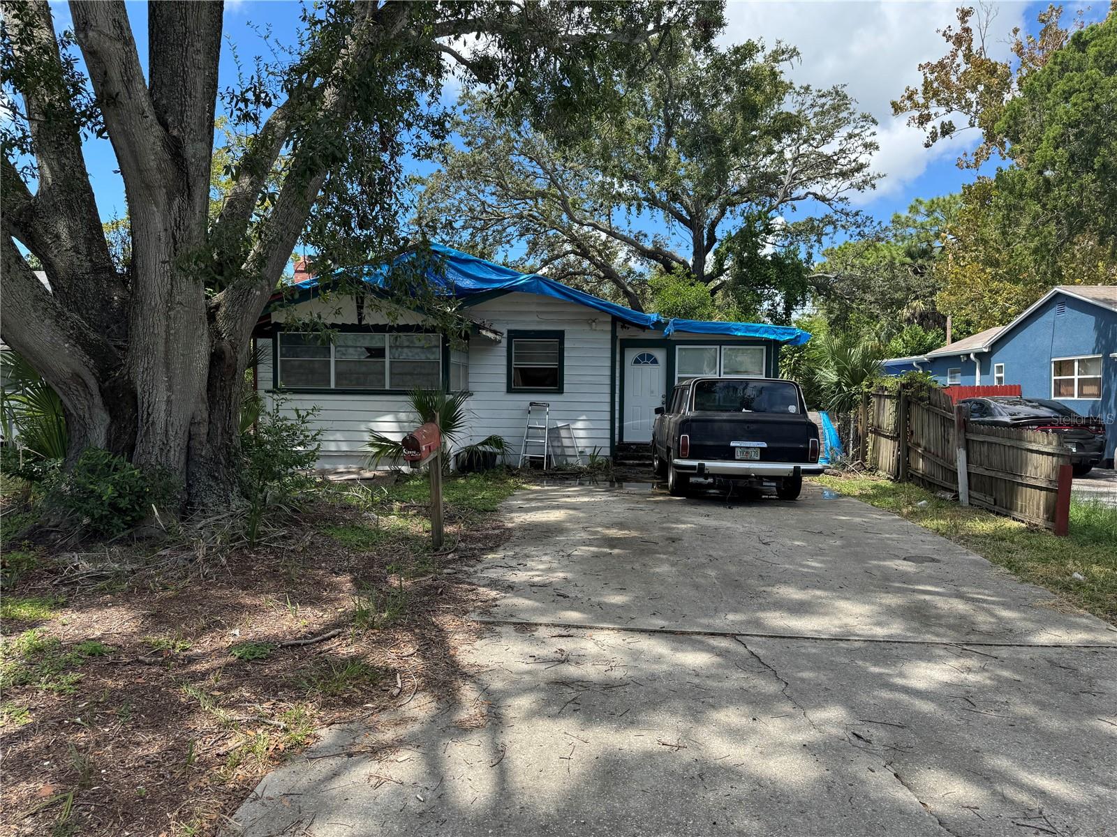 Investor special! This home sits on a desirable lot in St. Petersburg and offers a rare opportunity for a full renovation or rebuild. A tree recently damaged the property, and it is being sold strictly as-is—cash buyers only. The home will need significant repairs, but the potential is undeniable. Located at an impressive 57 feet above sea level, this property provides one of the highest elevation points in the area, adding long-term value and peace of mind. Whether you’re looking for your next fix-and-flip or a lot to build your dream home, this is the chance to create something special in a central location close to shopping, dining, and all that St. Pete has to offer.