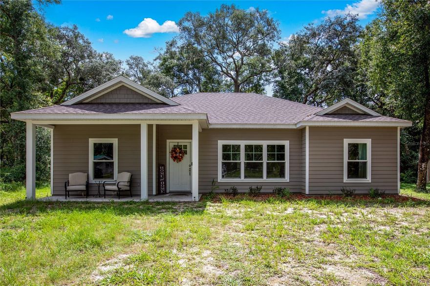 Built in 2023, this home offers the perfect balance of quality craftsmanship, comfort, and style. With 3 bedrooms and 2 bathrooms sitting on a half acre lot in the peaceful Silver Oaks Subdivision of Fanning Springs. From the moment you step inside, you are greeted by warm wood cabinetry, granite countertops, and luxury vinyl flooring that flows seamlessly throughout the open layout. A custom electric fireplace adds a cozy, one-of-a-kind centerpiece to the living area. Designed for everyday living the split bedroom floorplan offers privacy and functionality, with the master suite tucked away for quiet relaxation. It features a large walk-in closet, private bathroom with dual vanities, and a spacious walk-in shower. The two additional bedrooms are perfect for family, guests or a home office - whatever fits your style. With 0.51 acres of land, there is room to enjoy outdoor living, create your dream garden, or simply soak in the peaceful surroundings. Whether you are sipping coffee on the back porch or hosting a weekend BBQ the setting is ideal for making memories. Silver Oaks offers a quiet neighborhood feel, just minutes from some of North Florida's most treasured natural attractions. Take a walk or bike ride to Fanning Springs State Park, explore the Nature Coast State Trail, or launch a kayak into the nearby Suwannee River. You are also only a 5-minute drive from Chiefland, where you will find everything from shopping and dining to medical care and big-box convenience like Walmart and Tractor Supply. This home built in 2023 offers beautiful finishes, custom features, half-acre lot, easy access to natural springs and trails, and is competitively priced. This is more than just a new house - it's a home with character, comfort, and location all working in your favor. Don't miss the chance to see what makes this property stand out from the rest. Call today!