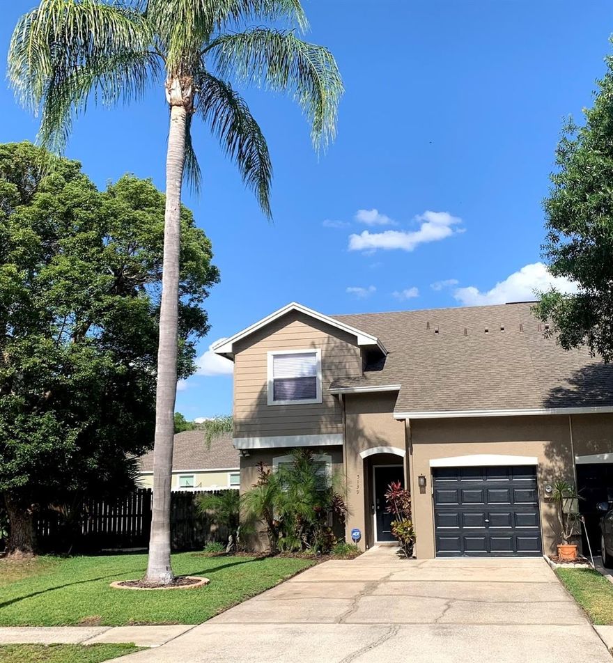 PRICE REDUCTION!    Discover the charm of 5139 Corvette Dr, Tampa, FL 33624, a beautifully updated 3-bedroom, 2.5-bath townhome that perfectly blends modern comfort with a serene, family-friendly environment. This duplex-style residence boasts a 1-car garage and a host of premium features, including an open-concept island kitchen with stunning granite countertops and sleek stainless steel appliances. The spacious living room, accented by a stylish shiplap wall, flows seamlessly into a practical under-stair storage area, while a versatile downstairs flex space is ideal for a home office or cozy den. Upstairs, three accommodating bedrooms provide ample space for relaxation, complemented by a second-floor laundry room for added convenience. Step outside to a surprisingly spacious backyard with no rear neighbors, offering a private oasis for outdoor enjoyment. Nestled in the vibrant Le Clare Shores community, residents enjoy access to a playground, scenic trails, and a picturesque lake with a covered picnic area and fishing dock—perfect for kayaking or canoeing. Located just minutes from Veterans Expressway, Carrollwood, and Citrus Park, this home offers unmatched convenience without sacrificing the tranquility of nature. Families will appreciate the A-rated schools zoning, making this an ideal primary residence or rental for those seeking affordability and quality. Explore nearby attractions within 20 miles, including the thrilling rides at Busch Gardens Tampa Bay (8 miles), the scenic trails of Lettuce Lake Park (12 miles), the family-friendly exhibits at ZooTampa at Lowry Park (7 miles), and the vibrant shopping and dining at International Plaza and Bay Street (10 miles). With its modern upgrades, peaceful surroundings, and proximity to Tampa’s best destinations, 5139 Corvette Dr is a must-see for your next home.