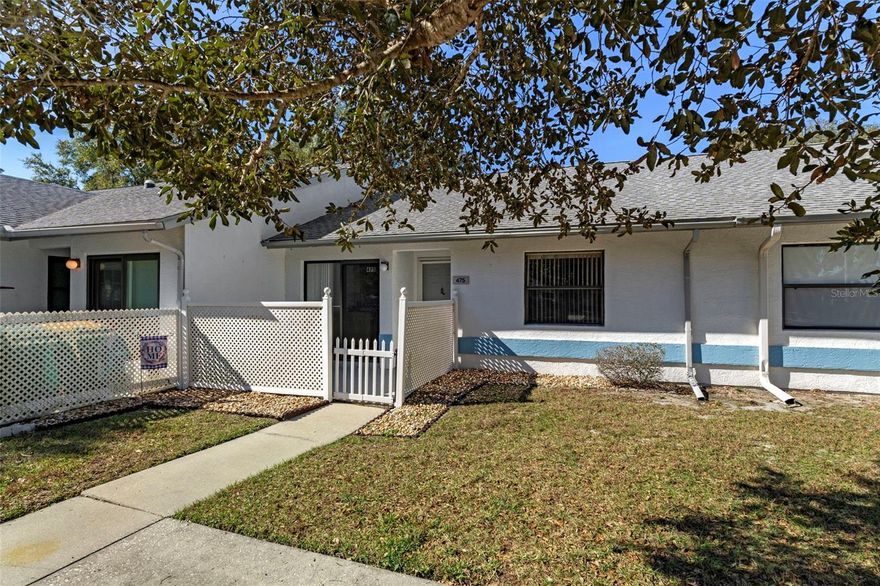 One or more photo(s) has been virtually staged. Welcome to this well-maintained and affordable home nestled in the desirable, deed-restricted community of The Landings at Inverness—just a short walk to historic downtown Inverness and the Withlacoochee Trail. This inviting residence offers the perfect blend of comfort, convenience, and low-maintenance Florida living. Inside, you’ll find a spacious living and dining room combo enhanced by a skylight and sliding glass doors that open to both the front and back porches, filling the home with natural light. The kitchen features newer sleek countertops, newer appliances, a large sink, and a separate breakfast nook—ideal for everyday living. Rough-hewn style laminate flooring adds warmth and durability throughout the common areas. The private primary suite includes an en suite bath with dual sinks and a large walk-in closet, while the second bedroom and bath provide flexibility for guests or a home office. Additional highlights include a Florida room, a screened-in back porch, washer and dryer included, and a fenced-in front patio for added privacy. Enjoy peaceful living with no rear neighbors and a beautiful natural Florida view in the backyard. HOA fee includes Cable TV and Internet, Community Pool, Trash, Exterior and Grounds Maintenance. Residents also have access to community boat docks, perfect for outdoor enthusiasts. An excellent opportunity to enjoy an affordable lifestyle in one of Inverness’ most convenient communities!