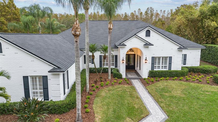 Welcome to this ULTRA EXCLUSIVE & PRIVATE ESTATE in the prestigious 24-hour Guard Gated Golf Community of Cheval. Nestled on a spacious 1.54-acre lot, this property extends its boundaries to encompass over 2.56 acres of pristine private pond & conservation views, making it a truly unique and remarkable find. Step into this 4663 square foot masterpiece and discover a world of luxury and comfort. The heart of this home is in the custom kitchen, where culinary dreams come to life. Updated in 2019 w/Custom Wood Cabinets, Sub Zero Refrigerator, GAS WOLF Double Oven w/ 6-Burner Stove & Flat top, WOLF Microwave, separate wet bar complete w/Wine & Beverage fridges, and sink w/built-in cabinets. This kitchen is a gourmet’s paradise w/an oversized island complete with storage, making it perfect for entertaining. With 4 EN-SUITE Bedrooms, 5.5 baths, a spacious home office which could easily be converted into a 5th en-suite bedroom, this home offers space and functionality for all your lifestyle needs. The Primary Suite includes HIS & HERS bathrooms, custom closets, a soaking tub and easy access to the lanai. And while the expansive 12’ ceiling heights & room sizes evoke impressions of grandeur, the home, still imparts a feeling of warmth & comfort. The stacked stone wood burning fireplace creates a cozy and inviting focal point for the family room. Open the three sets of sliding doors and dine al fresco on the covered lanai. The 50’ heated & saltwater lap pool & spa stretches across the entire width of the home and is fully automated. The Oversized 3 car garage is perfect for a golf cart and/or car enthusiast. Additional Updates Include: Fresh Exterior Paint (2023), Custom Outdoor Kitchen (2023), New Coping & Pavered Lanai (2023), Roof 2018, 2 AC units (2019 & 2014), Water Softener (2020), NEW Firepit (2023), New Landscaping (2023). This home is not just a treasure in itself, it’s part of an exceptional community. Cheval is renowned for its top-tier (A) Ranked Schools (elementary through high school) and an array of remarkable amenities. Enjoy access to an 18-hole golf course, a clubhouse w/newly renovated restaurant, pools, tennis & pickleball courts, a state of the art work out facility, and an equestrian center. This home is being sold furnished for an easy transition to move right in and start enjoying the Florida lifestyle. With its perfect blend of natural beauty, luxury, and community offerings, this Cheval Estate is the epitome of Florida living at its finest.