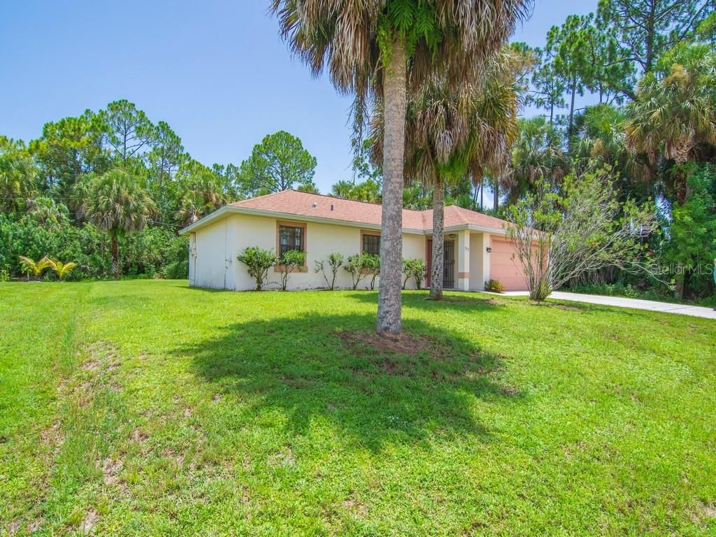 Photo of 557 Audubon Avenue NE, Palm Bay, FL 32907 (MLS # S5132527)