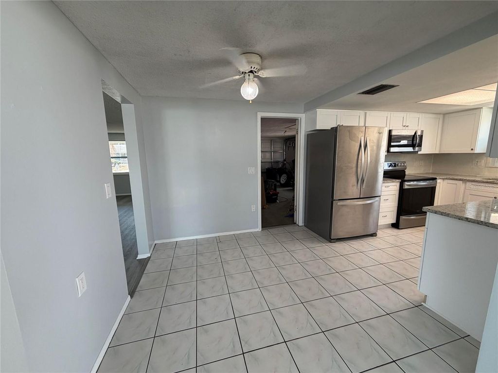 Photo of 10826 Piccadilly Road, Port Richey, FL 34668 (MLS # O6404235)