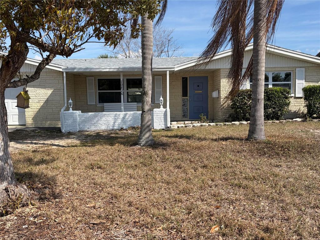 Photo of 10826 Piccadilly Road, Port Richey, FL 34668 (MLS # O6404235)